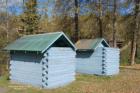 blue log outhouse buildings british columbia canada